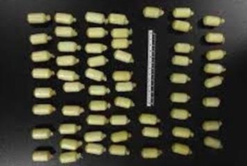 Nguoi 'lac da' nuot ma tuy trong duong day van chuyen xuyen quoc gia hinh anh