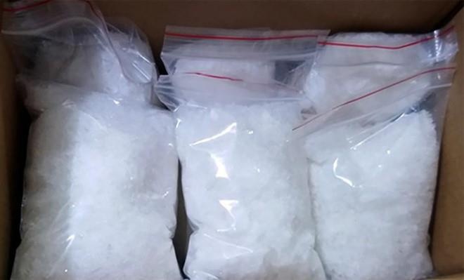 Mang 5 kg ma tuy tang vat di ban, cuu can bo cong an bi tu hinh hinh anh