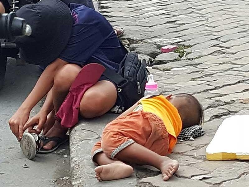 Nhuc nhoi canh tre le let an xin o TP.HCM hinh anh