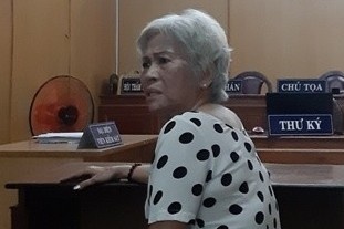 Nguoi dan ba cham lua thieu song tru tri hinh anh