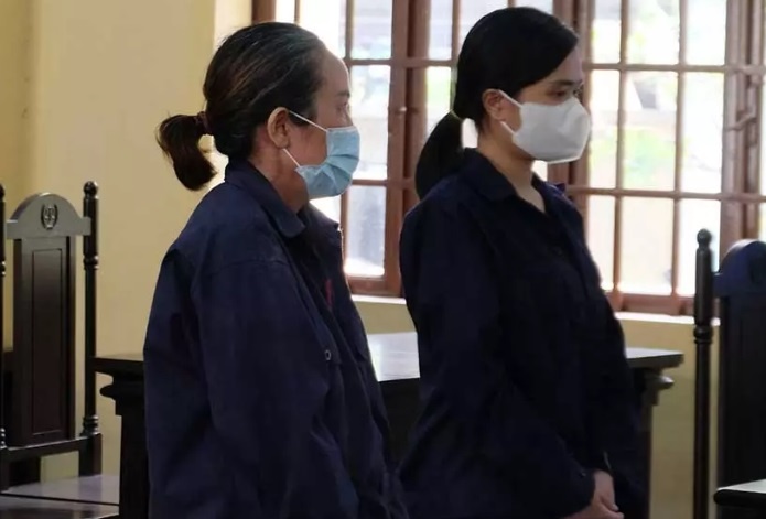 Doi tien ho tro Covid-19, hai me con lao vao danh cong an hinh anh