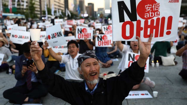 Kinh te lao dao buoc Nhat Ban va Han Quoc hoa hoan hinh anh