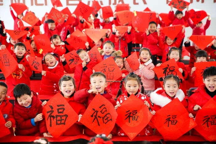 nguoi dan trung quoc ao at ve que an tet anh 1