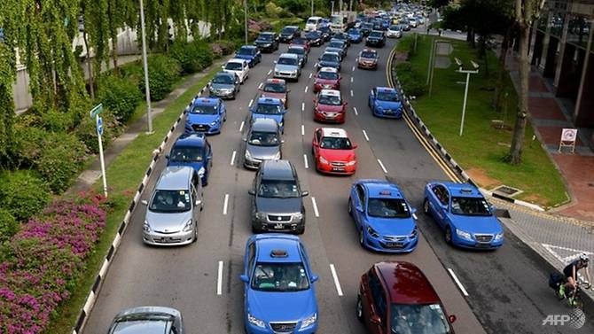 Singapore chi 55 trieu USD ho tro tai xe taxi chong dich virus Vu Han hinh anh
