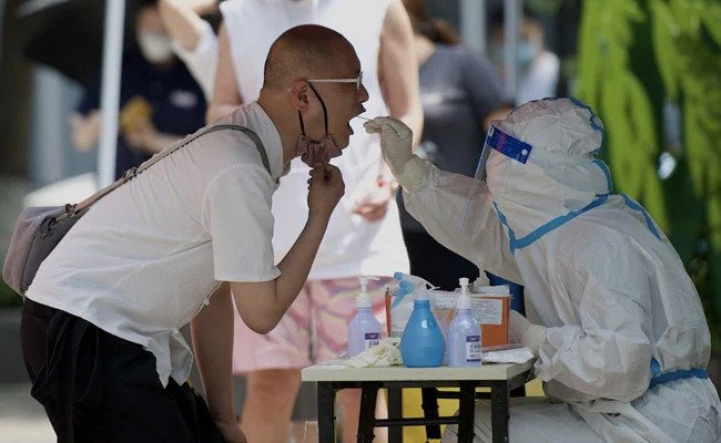 Nguoi dan ong Bac Kinh gay phan no vi khien 5.000 hang xom lien luy hinh anh