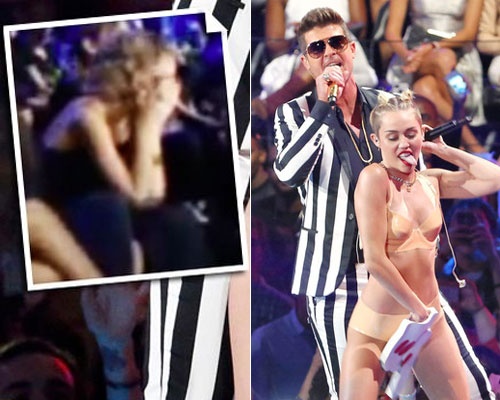 Taylor Swift che mat truoc man thac loan cua Miley Cyrus hinh anh