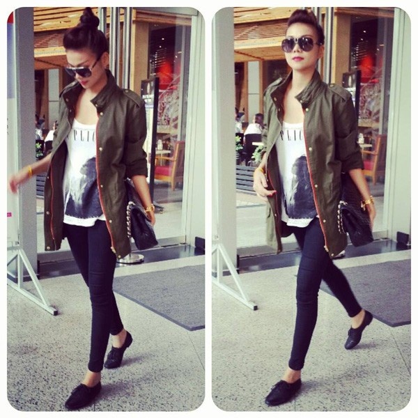 Thanh Hằng lại năng động khi lựa chọn kiểu tóc búi cao cùng phong cách military.