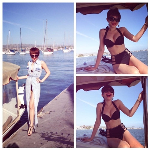 Tóc Tiên đột phá phong cách khi giấu bộ bikini gợi cảm trong chiếc áo denim dáng dài.