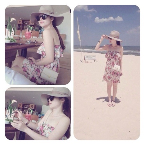 Váy hoa luôn là món đồ thời trang dễ tìm và dễ yêu nhất khi đi biển. Yến Nhi đẹp ngọt với bộ đầm hoa trần vai.