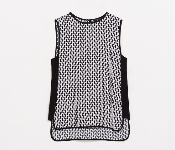 Dáng áo mullet năm nay được Zara đầu tư khá mạnh tay khi xuất hiện liên tục trong các BST của hãng. Chiếc áo này có hoạ tiết đen - trắng bắt mắt, kiểu dáng thú vị với hai bên eo tương phản tạo cảm giác gọn gàng, nhỏ nhắn cho người mặc, và hai vạt áo mullet bo tròn lạ mắt chắc chắn sẽ khiến chiếc quần skinny jeans nhàm chán trở nên sành điệu hơn rất nhiều. Bạn có thể phối nó với giày cao gót mũi nhọn đơn giản, giày T-strap hay một đôi cut-out boots đều rất đẹp và cá tính. Giá của nó là 40 euro, tương đương khoảng 1,2 triệu VNĐ. 