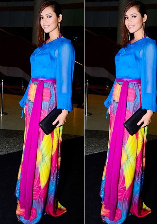  Á hậu Hoàng My muốn gây ấn tượng nhưng cô không thành công với váy rườm rà, lòe loẹt.