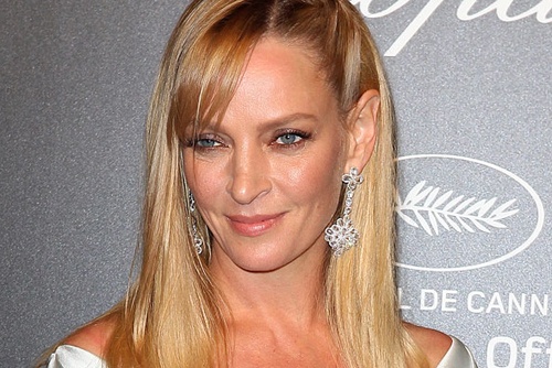 Uma Thurman tan cong phong vien hinh anh