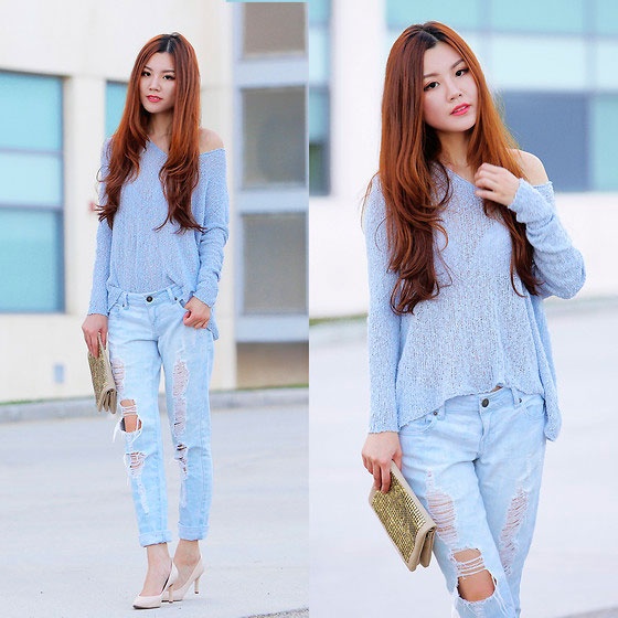 Áo len dệt kim mỏng là mốt thịnh hành của thu năm nay. Nếu bạn chọn cách kết hợp với quần jeans rách sẽ rất hiện đại và hợp trong nhiều hoàn cảnh.