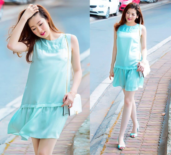 Tuần qua Tú Anh lựa chọn dáng váy suông thoải mái với tông màu xanh  dịu mát xuống phố. Đây là thiết kế và tông màu dễ mặc, phù hợp  với nhiều form dáng khác nhau.