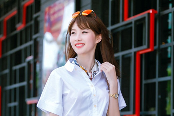 Phong cach thoi trang cua 3 hoa hau 9X hinh anh