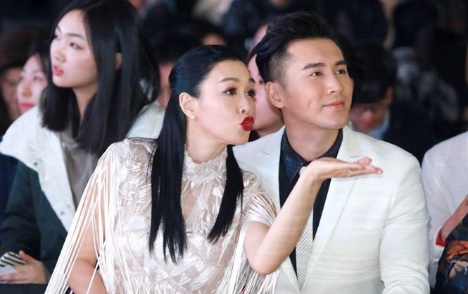 Vo chong sao nu goc Viet du tiec ben dan nghe si quyen luc Hong Kong hinh anh