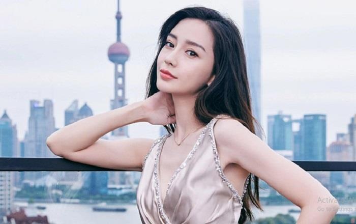 Angelababy khong deo nhan cuoi giua on ao ly hon Huynh Hieu Minh hinh anh