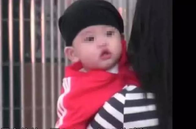 Anh can mat con trai ut cua Truong Ba Chi sau mot nam giau kin hinh anh