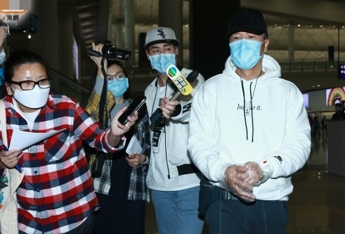 Chan Tu Dan phai deo vong tay theo doi khi tro ve Hong Kong hinh anh