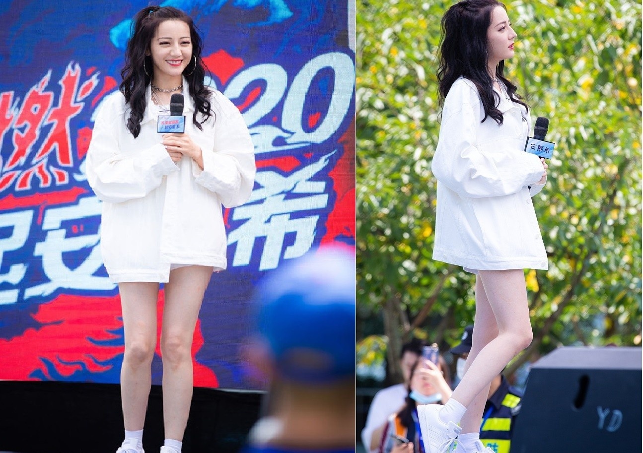 Dich Le Nhiet Ba mac short khoe doi chan dai 1,09 m hinh anh