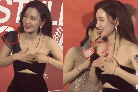 Hoa hau Hoan vu Truong Manh gap su co trang phuc tren tham do hinh anh