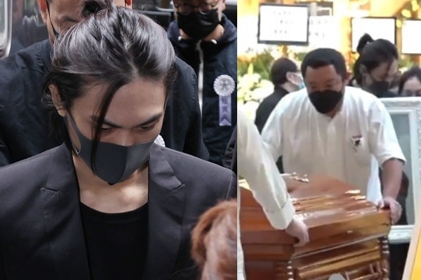 Con trai guc dau ben di anh Ngo Manh Dat trong le hoa tang hinh anh