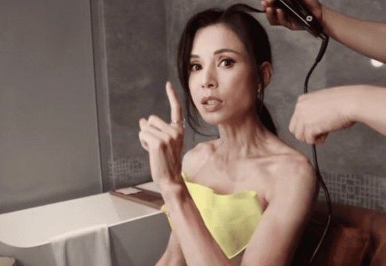 Ly Nhuoc Dong gay go vi ep can hinh anh