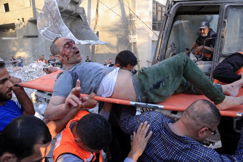 nguoi dan ong mat vo va con sau dot khong kich cua israel anh 2