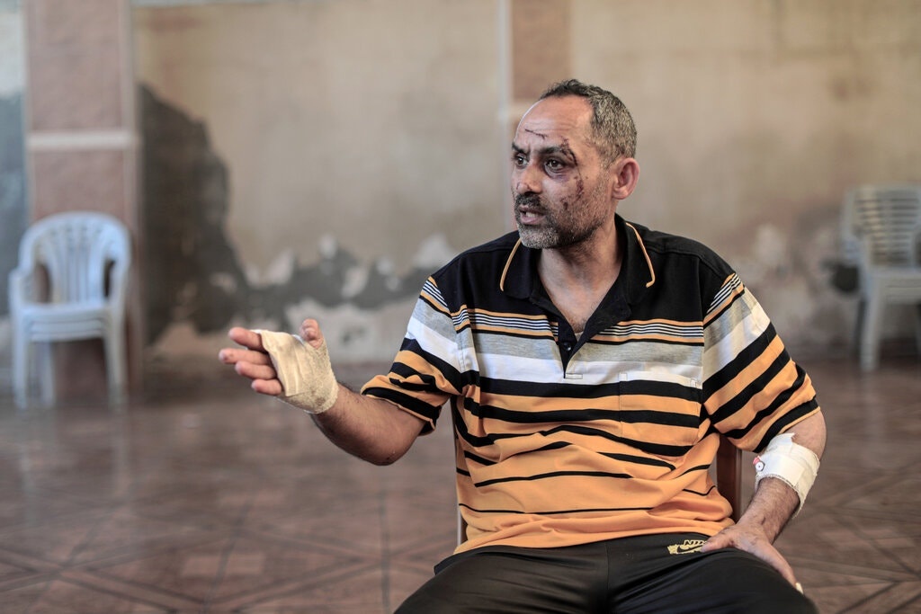 nguoi dan ong mat vo va con sau dot khong kich cua israel anh 3