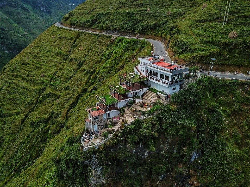 Chu nha 7 tang o Ma Pi Leng xay cong trinh vi chinh quyen ung ho? hinh anh