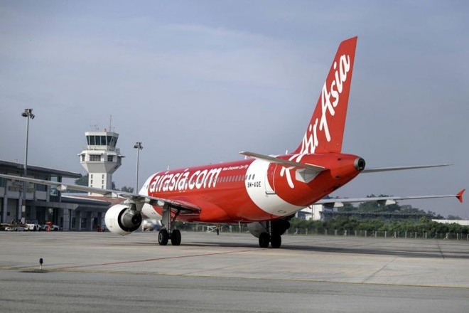 Air Asia bi phat 25 trieu vi khong den bu cho khach khi bi delay hinh anh