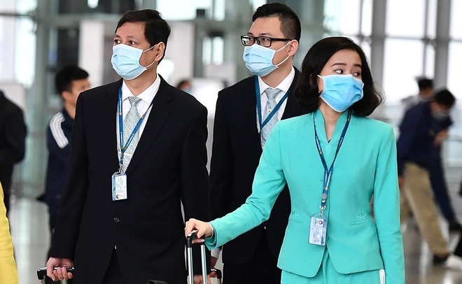 'Vietnam Airlines se het to bay neu bat cach ly du 14 ngay' hinh anh