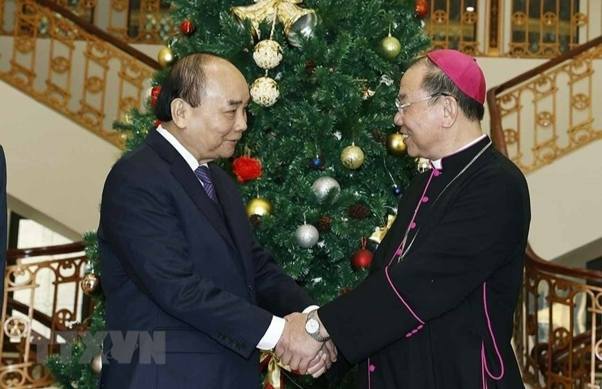 Chu tich nuoc tham Tong Giao phan Ha Noi truoc Giang sinh hinh anh