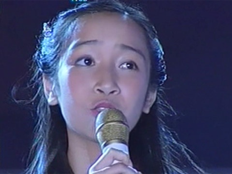 Bai hat truyen cam hung cua co be co khuon mat thien than hinh anh