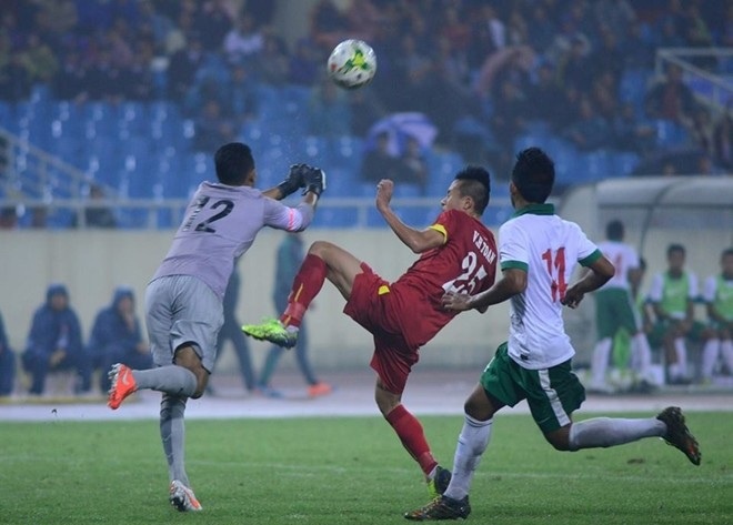 Huy Toan mo ty so cho Olympic Viet Nam hinh anh