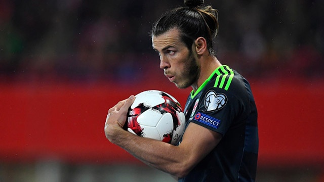 Xu Wales bi tuyen Ao cam hoa 2-2 hinh anh