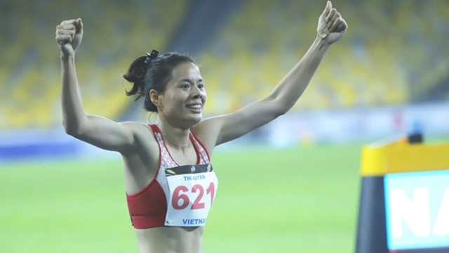 Nguyen Thi Huyen pha ky luc SEA Games noi dung 400 m rao nu hinh anh