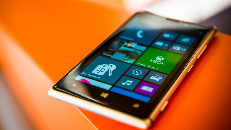 Vi sao toi tu bo Windows Phone de den voi iPhone? hinh anh