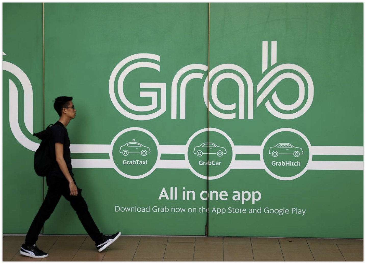 Grab bi Philippines, Malaysia va Singapore dieu tra vi mua Uber hinh anh