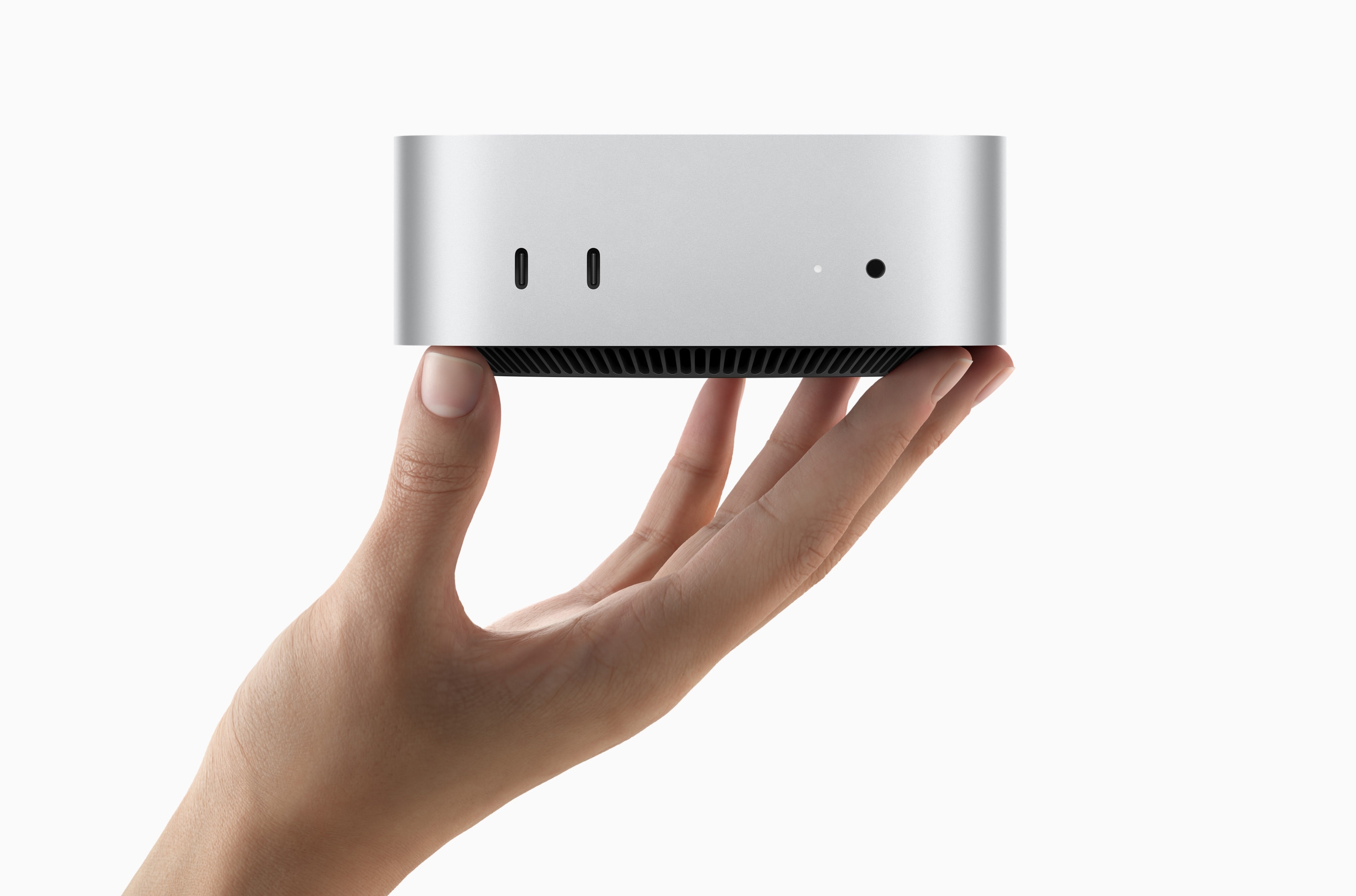 May tinh moi cua Apple nam gon tren tay hinh anh