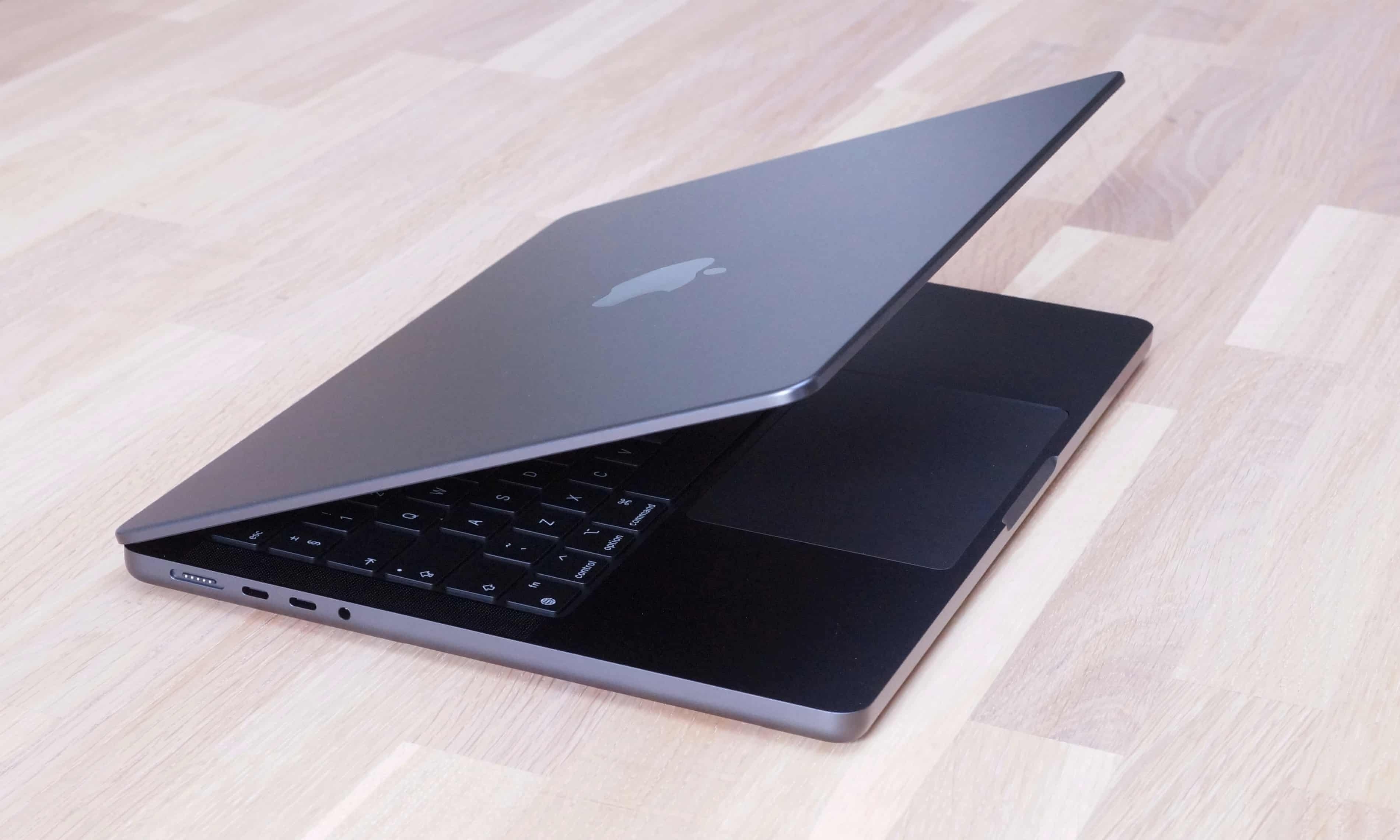 Apple lan dau tiet lo 'tinh nang' an cua MacBook hinh anh