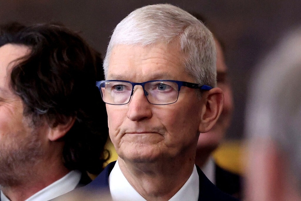Tim Cook bi ong Trump 'trung phat'? hinh anh