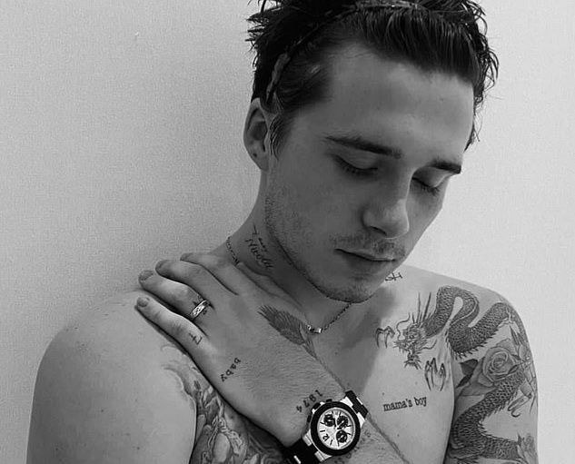 Brooklyn Beckham dang phu kin nguoi bang hinh xam hinh anh