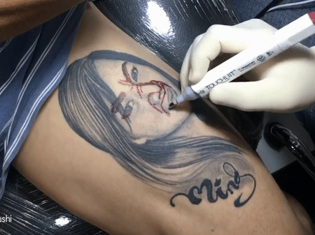 Thay hinh ban gai thanh Samurai va loat hinh xam chua chay an tuong hinh anh