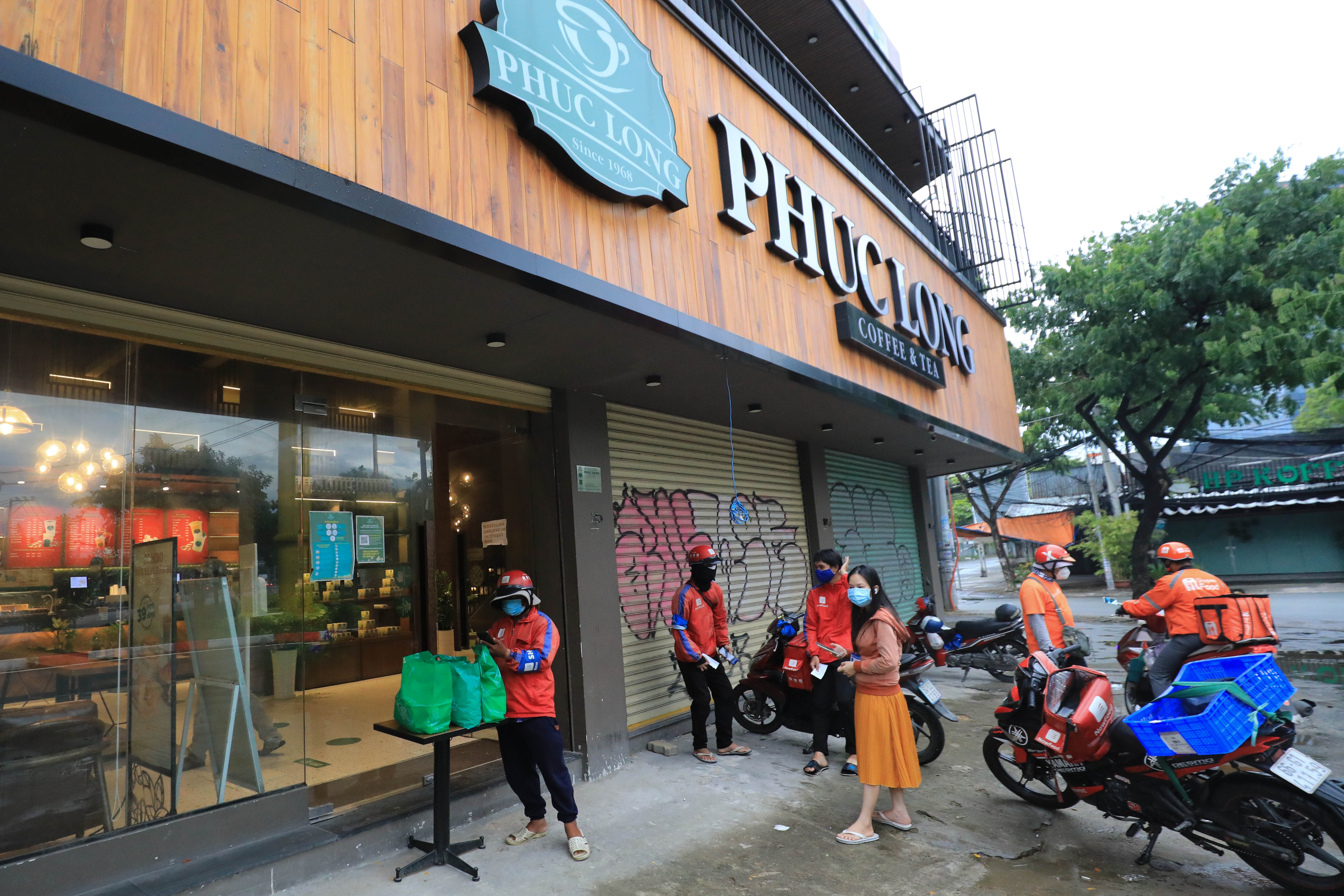 Chuoi cafe dau tien mo lai o TP.HCM anh 1