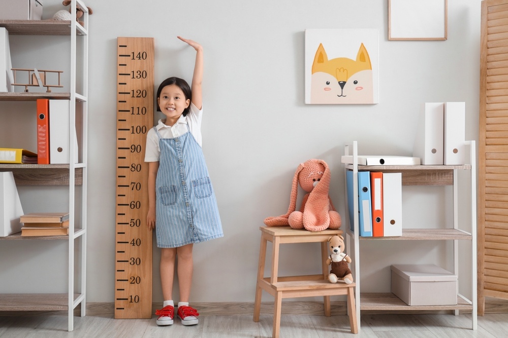 Dau hieu nhan biet som tre cham tang chieu cao hinh anh