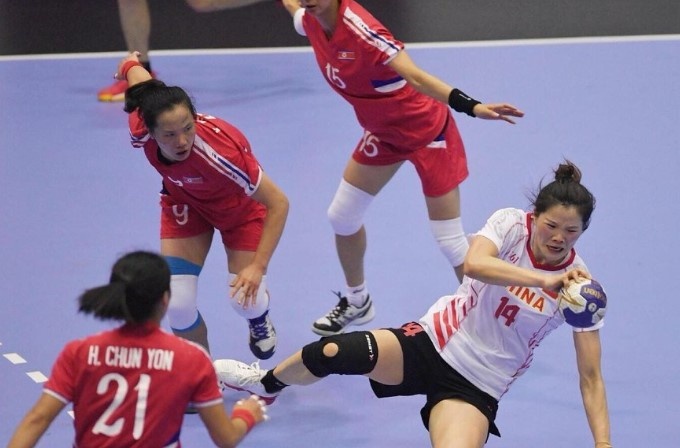 Bong nem nu Trung Quoc bo Olympic vi virus corona hinh anh