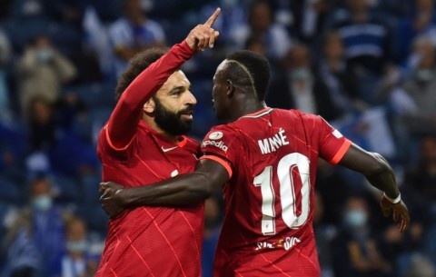 Salah, Firmino lap cu dup giup Liverpool thang Porto 5-1 hinh anh