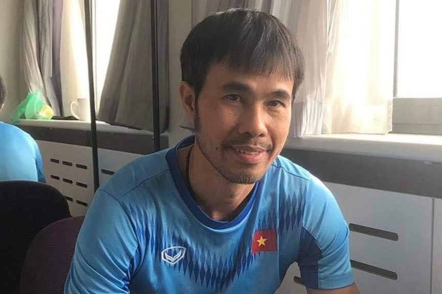 HLV Minh Giang co suc khoe tot khi ve den Viet Nam hinh anh