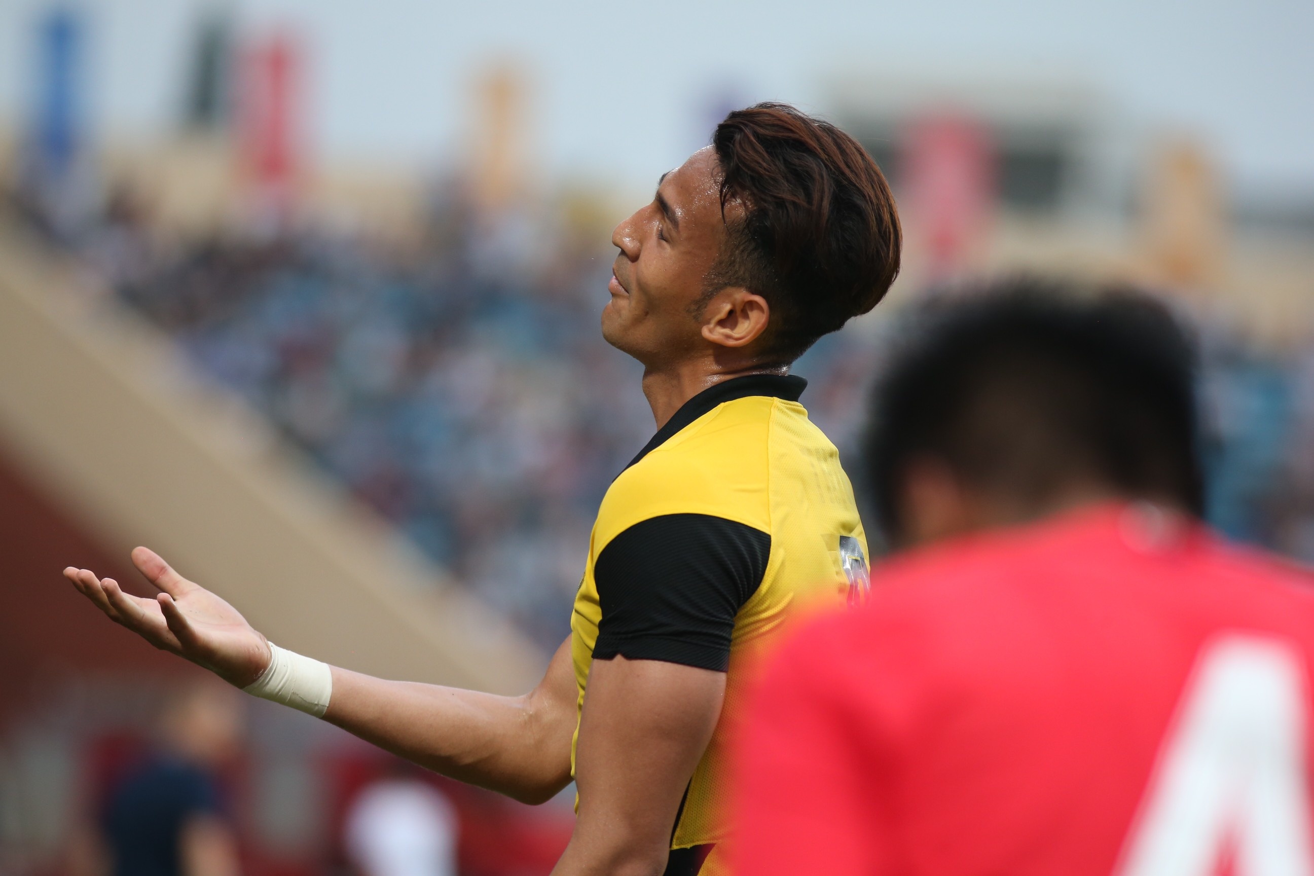 u23 malaysia phan ung trong tai anh 4